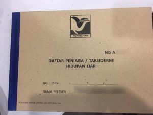 Front cover of WILDLIFE Malaysia logbook for dealer & taxidermist